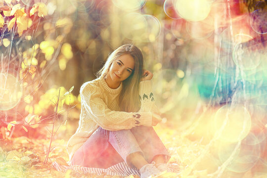 girl sitting autumn park, autumn season september in the forest