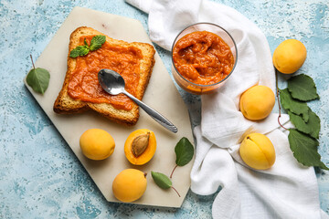 Composition with bowl of tasty apricot jam, sandwich and fruits on color background