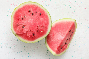 Cut ripe watermelon on light background