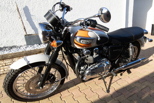 triumph bonneville t100 sign text and brand logo on motorcycle classic from uk