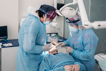 Dentists Working in Dental Clinic