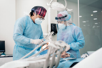 Dentists Working in Dental Clinic