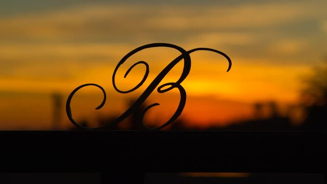 Time Lapse Lockdown Shot Of Silhouette Of Alphabet B During Sunset - Los Angeles, California