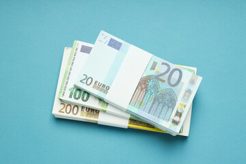 Concept of financials, money on blue background