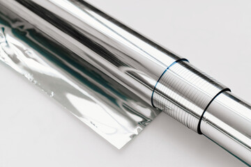 a roll of foil for baking on a white background. 