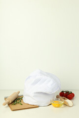 Composition with chef hat for concept of cooking, space for text