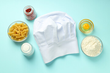Composition with chef hat for concept of cooking, top view
