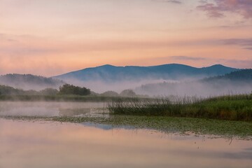 Fototapeta na wymiar Sunrise at the lake Cerknica, Cerknisko jezero, intermittent lake, Cerknica Polje, Nature reserve Rakov Skocjan, Slovenia, Europe