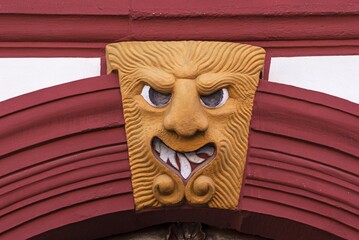 Grotesque above a gate entrance of an old farmstead from 1733, Koenigsberg, Lower Franconia, Bavaria, Germany, Europe