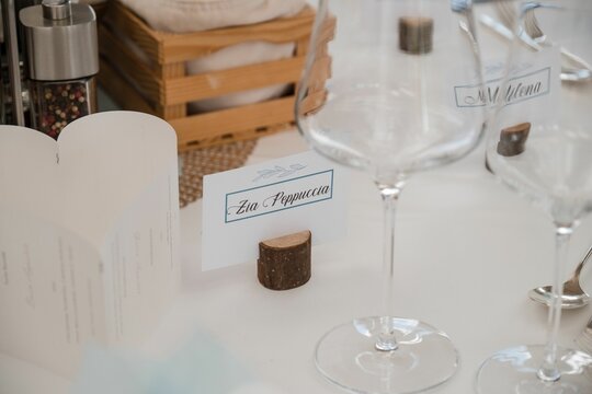 Closeup Of A Place Setting With Name Tag On Table At Wedding Banquet.