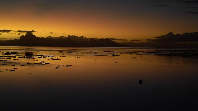 Kayak during Sunset with Moorea in the background