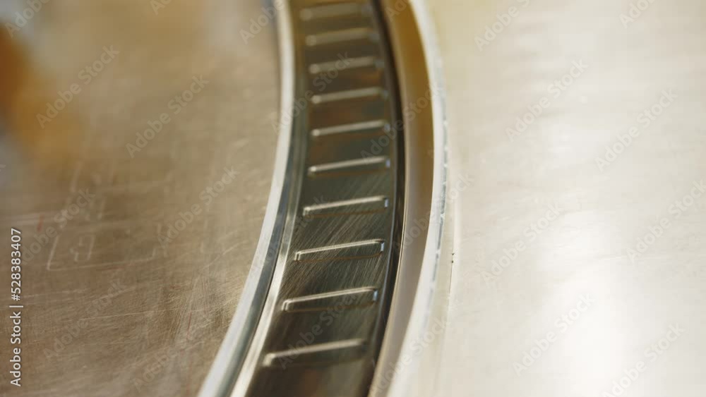Poster close up view of metal press machine in movement while working