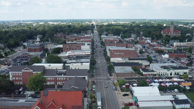 Bowling Green, Ohio downtown skyline drone video moving forward.
