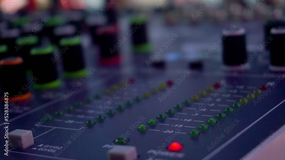 Poster lamp indicator on the sound amplifier. led indicator of sound level signal on the mixing console of 