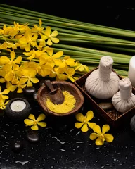 Poster Lifestyle and Healthy Concept. Spa setting for massage treatment on black background © Mee Ting