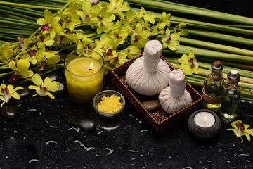 Lifestyle and Healthy Concept. Spa setting for massage treatment on black background