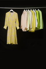 Set of different clothes,dress, for females on hanging