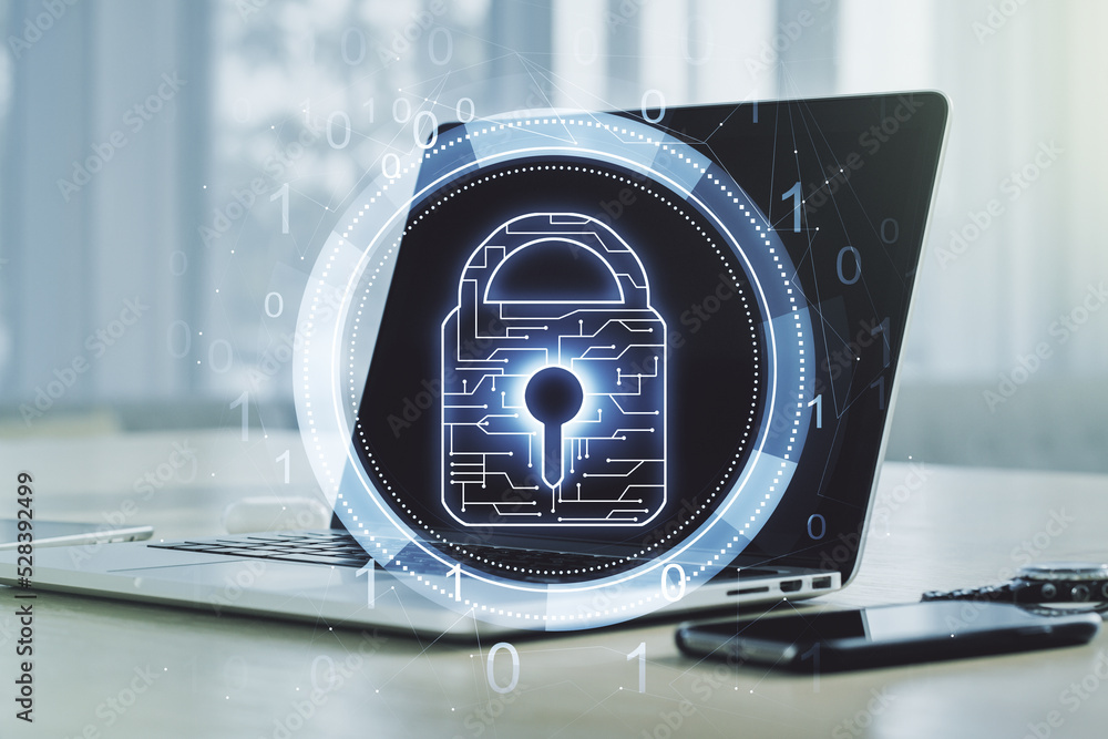 Poster double exposure of creative lock hologram with chip on laptop background. information security conce