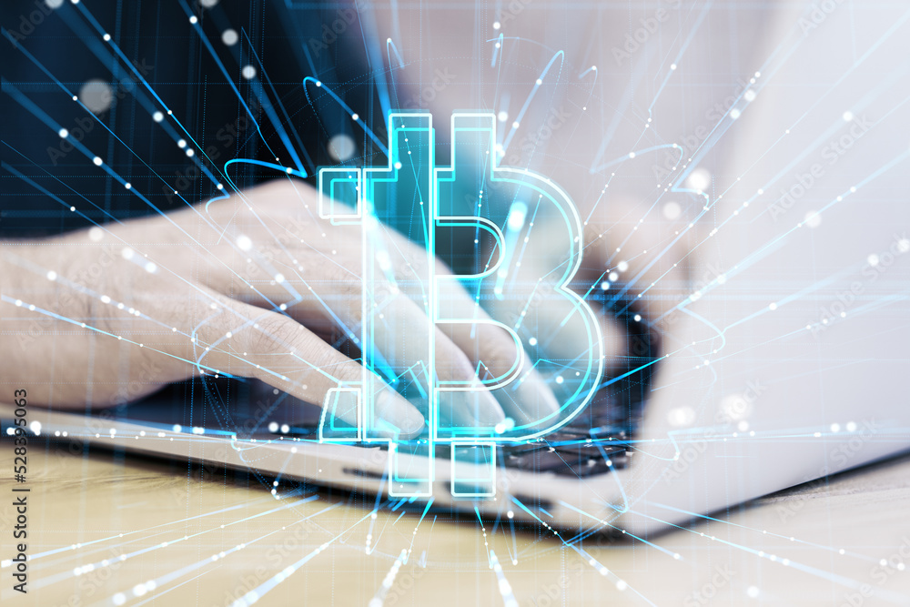 Poster Close up of hands using notebook with glowing digital bitcoin hologram and lines on blurry background. Cryptocurrency, online banking, app and finance concept. Double exposure.