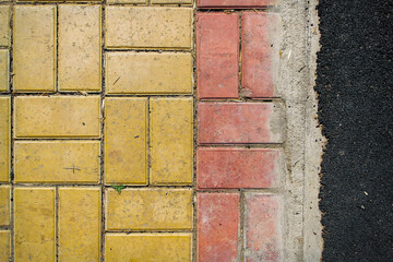 Pavement. Sidewalk tiles background. Pavement tiles. Top view. Closeup. Footpath. Two tone sidewalk...