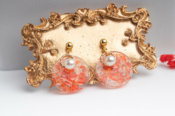Resin earrings mixed with dried flowers
