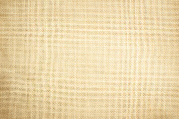 Jute hessian sackcloth canvas woven texture pattern background in light beige cream brown color blank empty	
