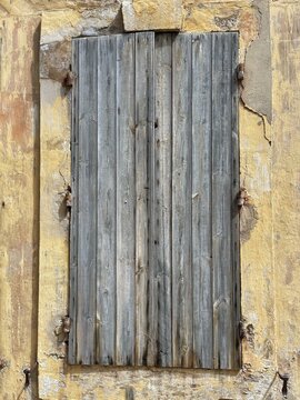 Close-Up of a weathered wooden shutter on a house, Saint-Remy-de-Provence, Bouches-du-Rhone, Provence-Alpes-Cote d'Azur, France