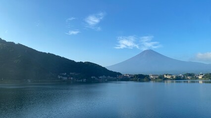 Mt. Fuji on a clear sky, defined lines of the gentle slope and the high point of tip is visible, a...