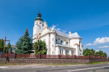 Fototapeta na wymiar Church of st. Catherine and St. Walenty in Wojcin, Lodz Voivodeship, Poland