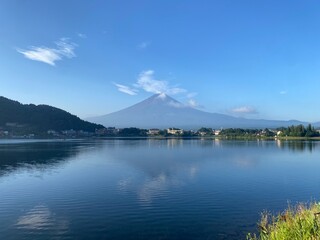 Beautiful thin clouds dances around the top of the Mt. Fuji, the summer view of the clear...