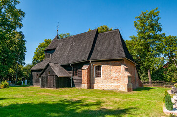 Fototapeta na wymiar Wooden church of the Holy Trinity, Baldwinowice, Opole Voivodeship, Poland
