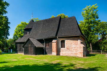 Fototapeta na wymiar Wooden church of the Holy Trinity, Baldwinowice, Opole Voivodeship, Poland