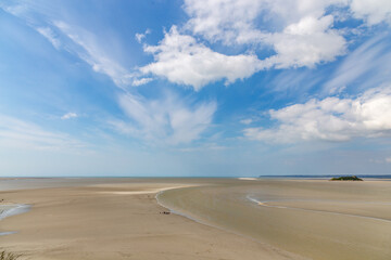 Fototapeta na wymiar Beautiful view from the Mont Saint-Michel Abbey to the Atlantic Ocean at low tide. France