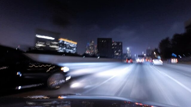 Time Lapse Shot Of Cars Moving On Road In Illuminated City At Night - Los Angeles, California