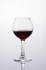 Glass of red wine for tasting