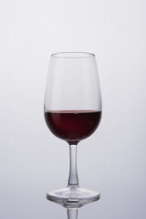 Glass of red wine for tasting