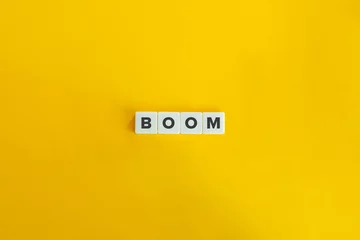 Foto auf Alu-Dibond Boom Word on Block Letter Tiles on Yellow Background. Minimal Aesthetics. © photoopus