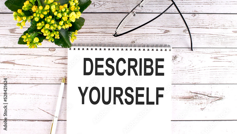 Poster describe yourself text concept write on notebook on wooden background