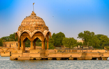 Ancient architecture ruins at Gadisar Lake also called Gadaria Lake is located in the Jaisalmer...