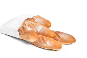 A French loaf in a white paper bag insulated on a white background. White bread in a craft bag. A paper bag full of bread.