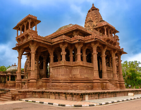 View of Scenic, landscaped grounds featuring tomblike monuments, a temple, statues , the ruins of Mandore Garden, Jodhpur,Rajasthan,India