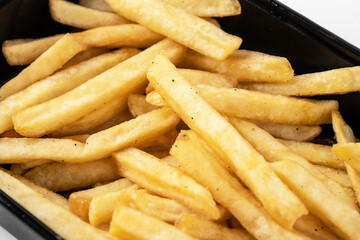 Potato fry or french fries on white isolated background.