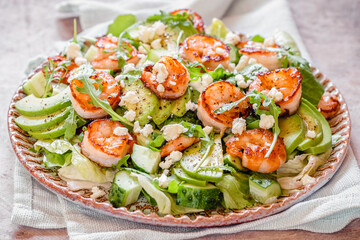 Salad with shrimps, avocado and cucumber