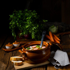 Potato kohlrabi soup with bockwurst