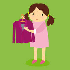 girl holding a hanger with a jacket