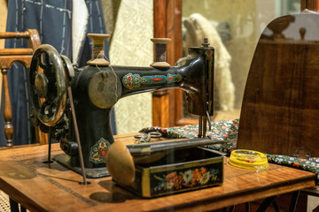 Vintage sewing machine and old sewing workshop