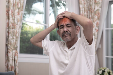 Health care, pain, stress, age and people concept - senior people suffering from headaches at home