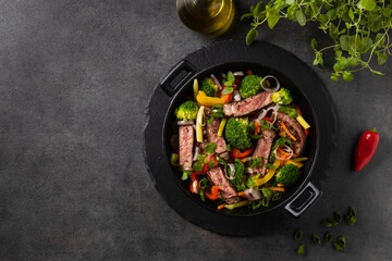 Beef with vegetables. Prepared in a wok.