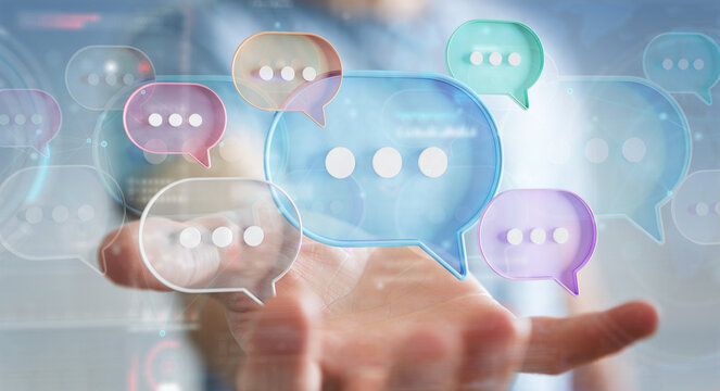 Businessman using digital speech bubbles talk icons. Minimal conversation or social media messages floating over user hand. 3D rendering