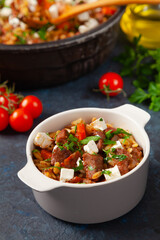 Traditional Greek cuisine. Lamb stew with feta cheese and vegetables.